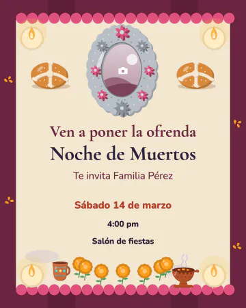 La ofrenda en la mesa. Pan, veladoras, flores y la foto, vistos desde arriba.
